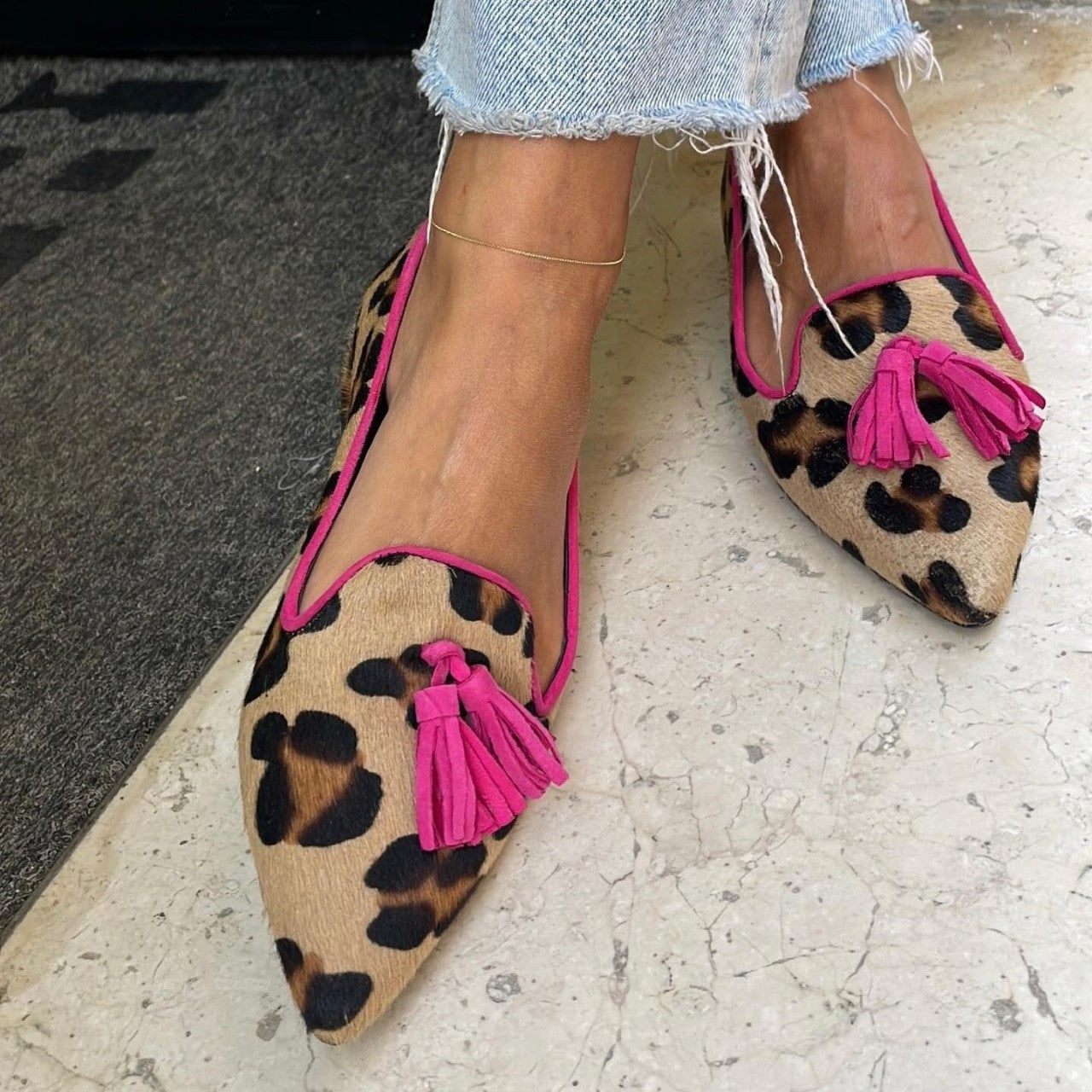 Ballerinas mit Animal-Print und schicken Quasten